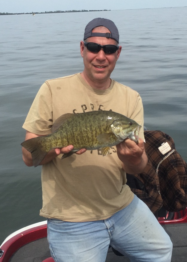Mike Beals again looking warmer and happy with a colorful Lake St Clair smallmouth