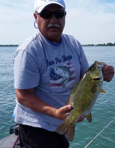 Pete with one of the three 4 1/2 pound smallmouth caught that day. This one from Anchor Bay