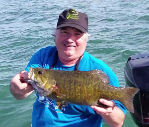 Wayne with a 4 1/2 pound Mile Roads smallmouth caught on one of the last casts of the day.